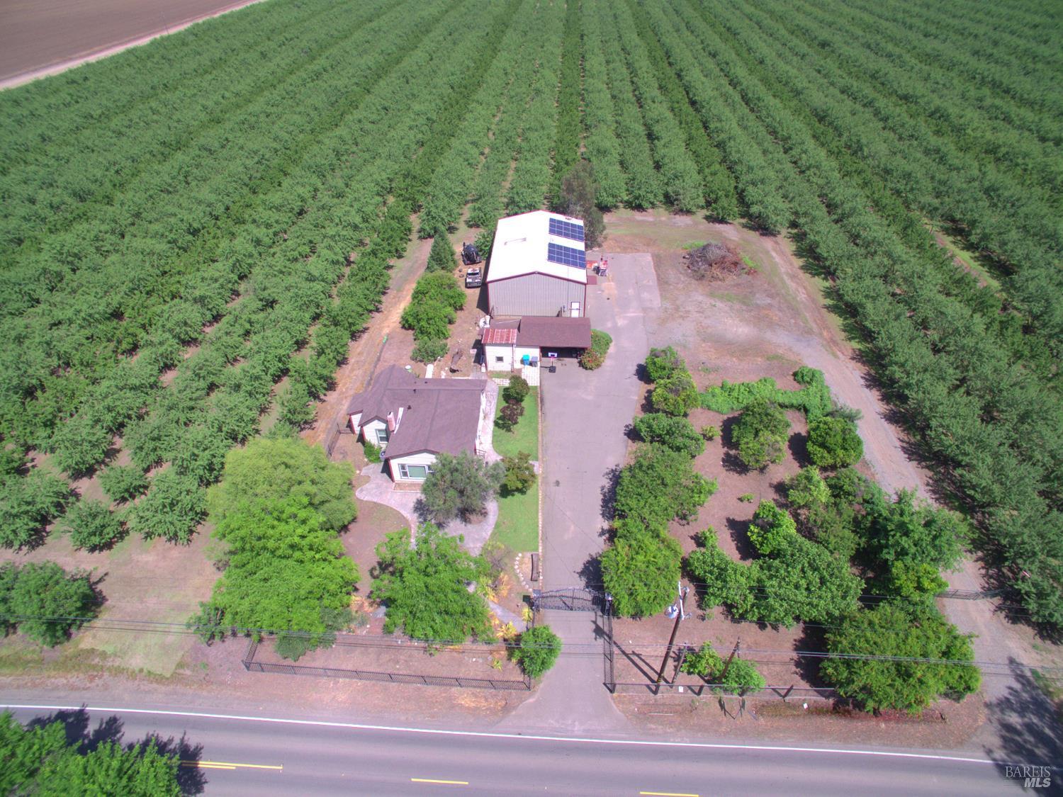 7948 North Meridian Road Dixon, CA 95620 - Photo 54 of 59 an aerial view of a house with yard
