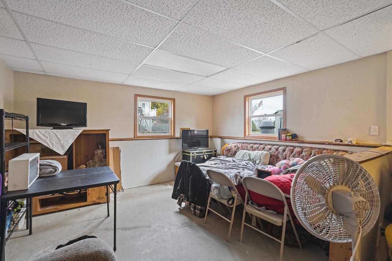 175 Harvest Moon Trail Capron, IL 61012 - Photo 19 of 27 a bedroom with furniture and a window