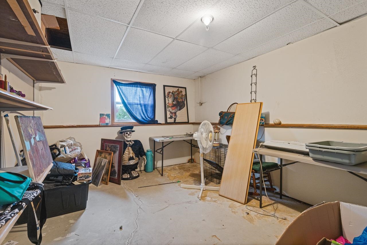 175 Harvest Moon Trail Capron, IL 61012 - Photo 23 of 27 a view of a room with gym equipment