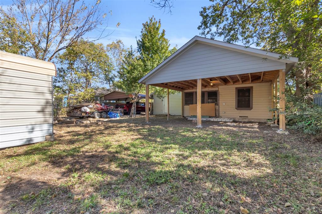 929 North Hall Street Lancaster, TX 75146 - Photo 24 of 24 a view of a house with a yard