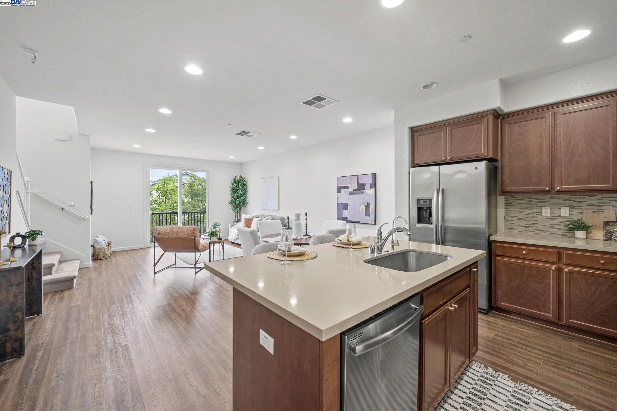 2336 Carbondale Way Dublin, CA 94568 - Photo 17 of 54 a kitchen with stainless steel appliances granite countertop a sink and stove