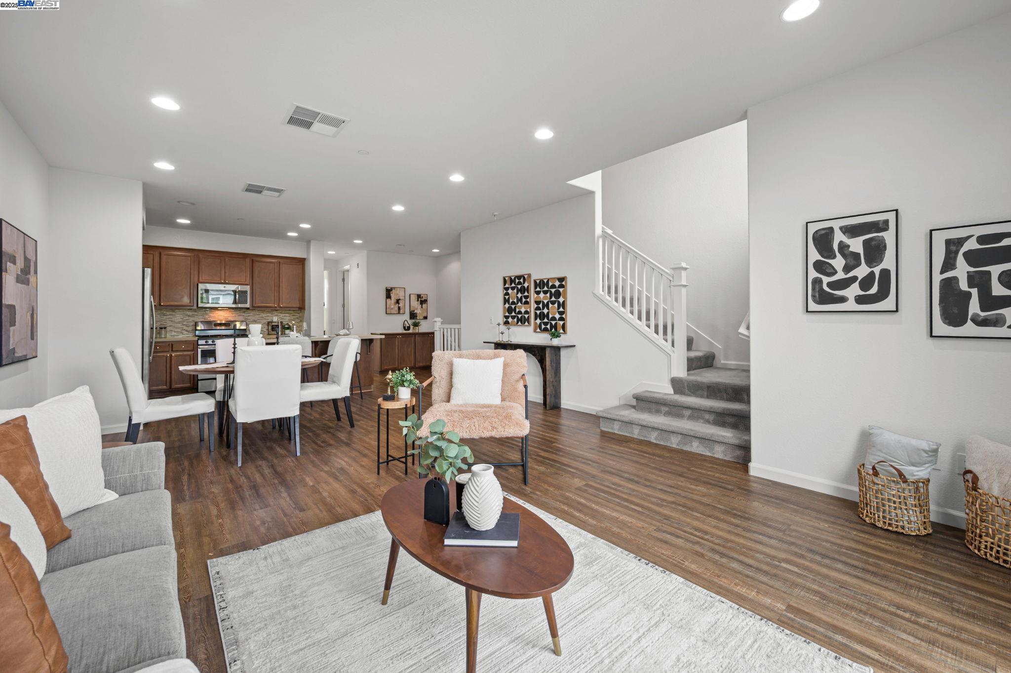 2336 Carbondale Way Dublin, CA 94568 - Photo 25 of 54 a living room with furniture and kitchen view