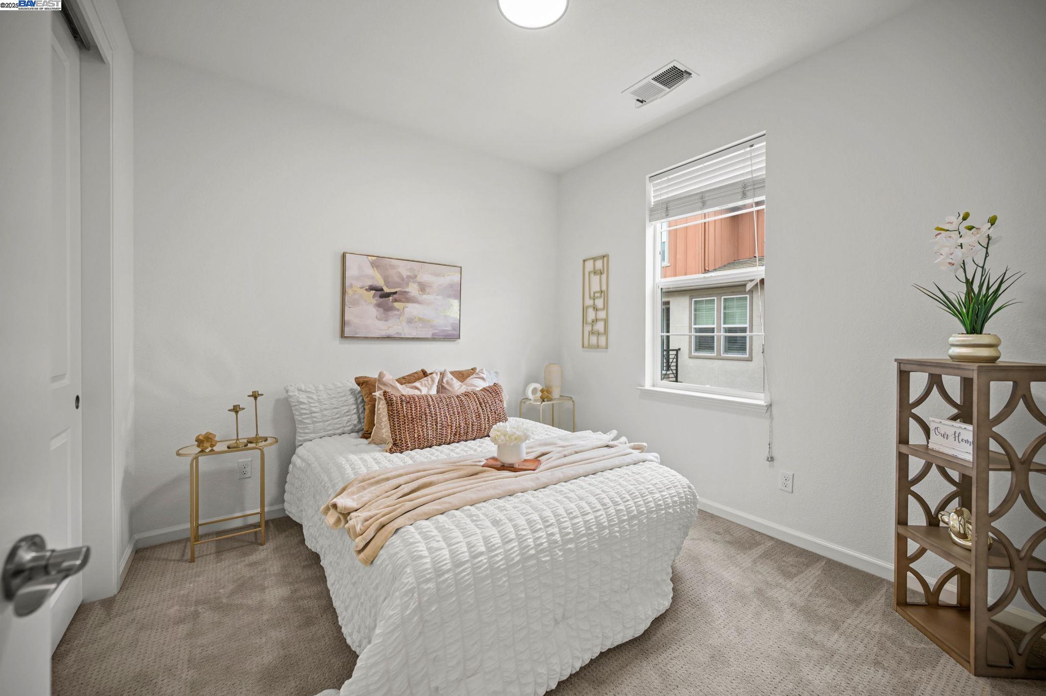 2336 Carbondale Way Dublin, CA 94568 - Photo 26 of 54 a bedroom with a bed and a window