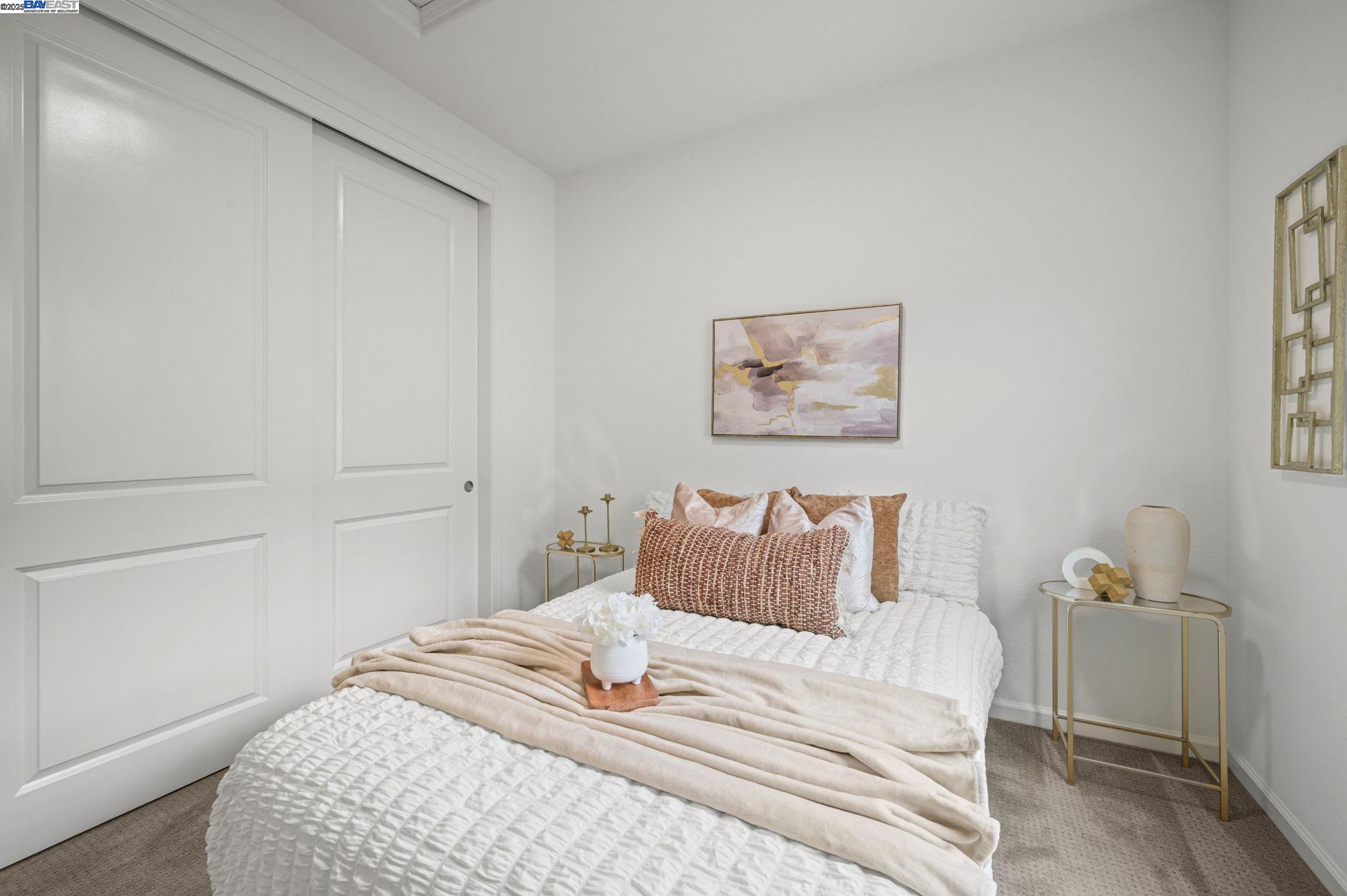 2336 Carbondale Way Dublin, CA 94568 - Photo 27 of 54 a bedroom with a bed and a wall painting