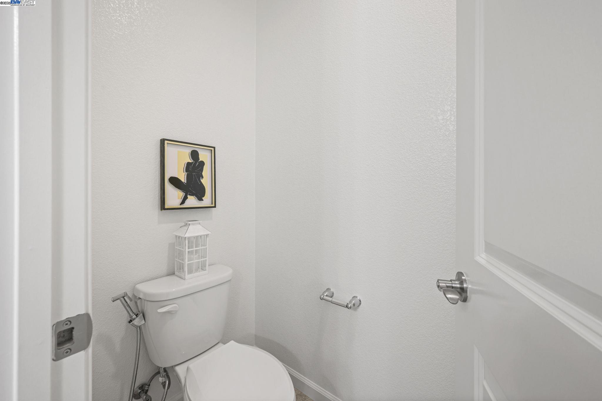 2336 Carbondale Way Dublin, CA 94568 - Photo 42 of 54 a white toilet sitting next to a white walls