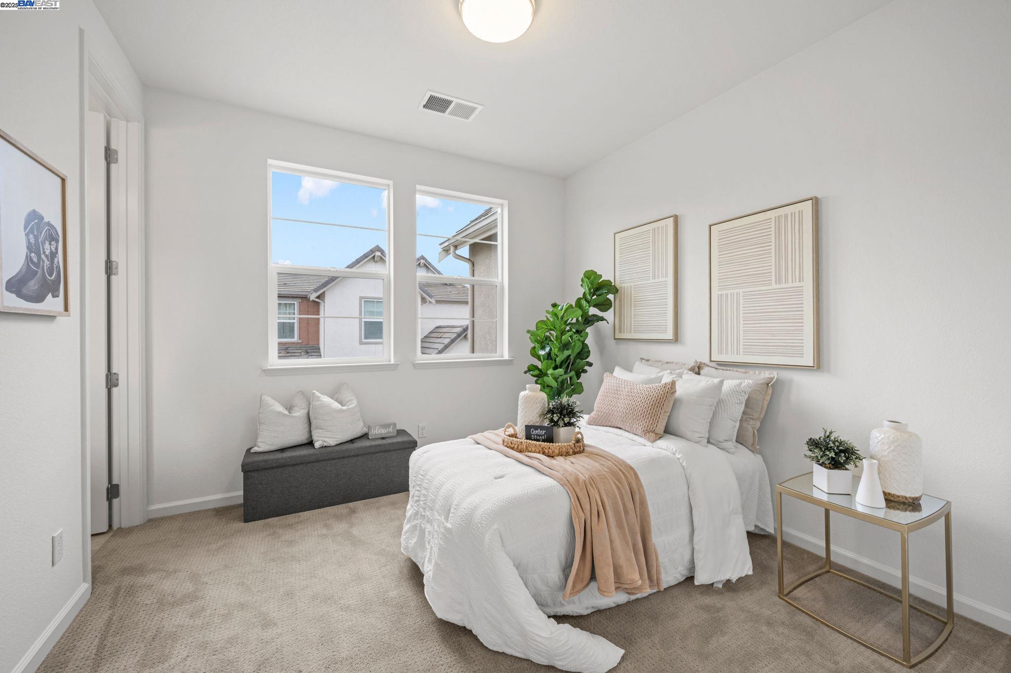 2336 Carbondale Way Dublin, CA 94568 - Photo 43 of 54 a bedroom with a bed and a couch