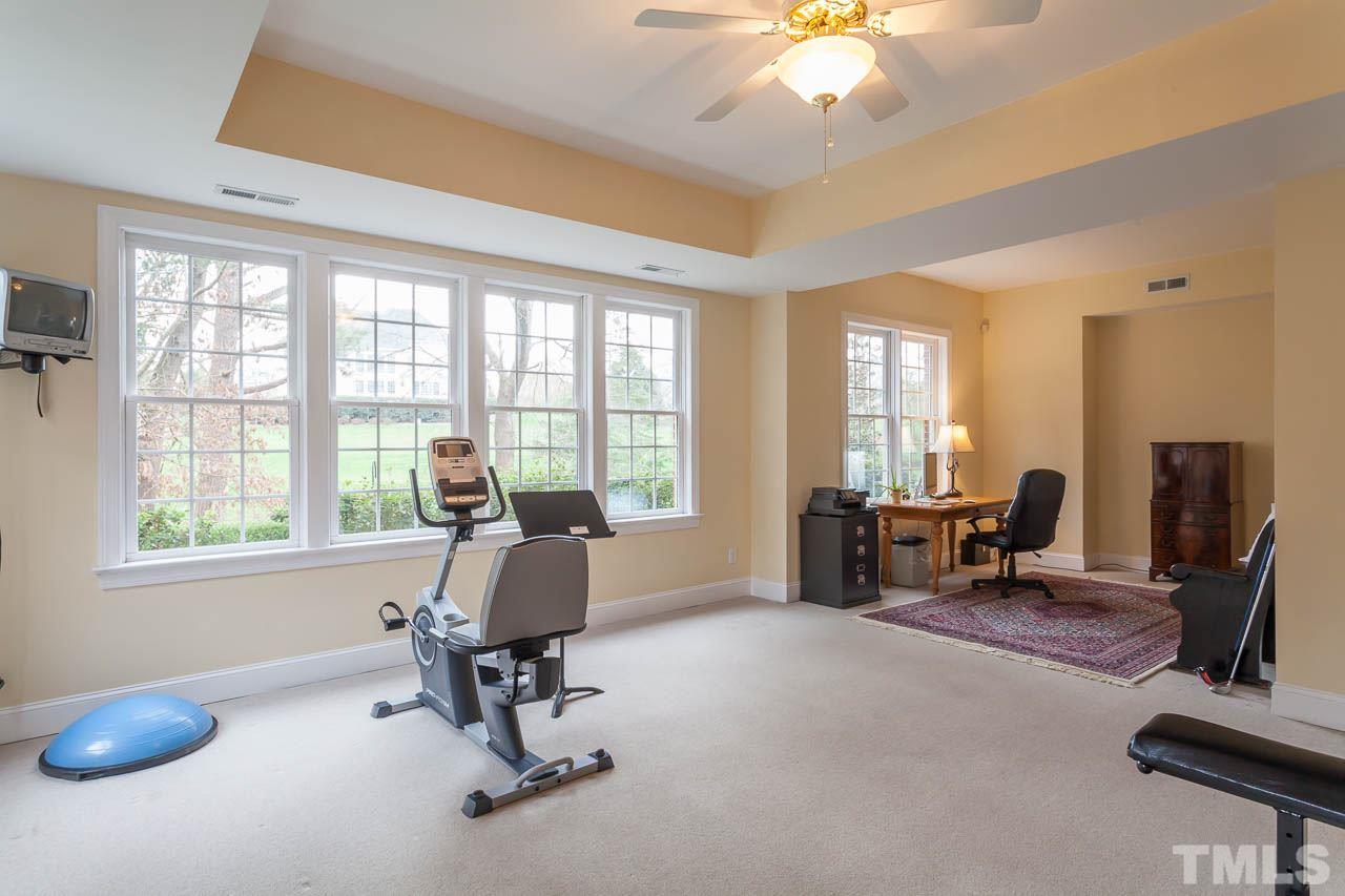 12420 Bayleaf Church Road Raleigh, NC 27614 - Photo 22 of 25 a view of a livingroom with workspace and a window