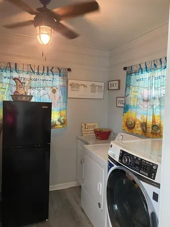 a utility room with dryer and washer