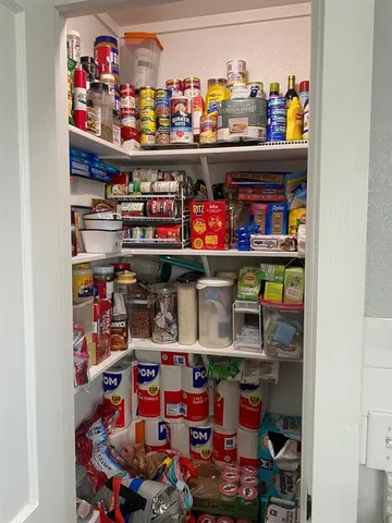 a room with lots of different kinds of food