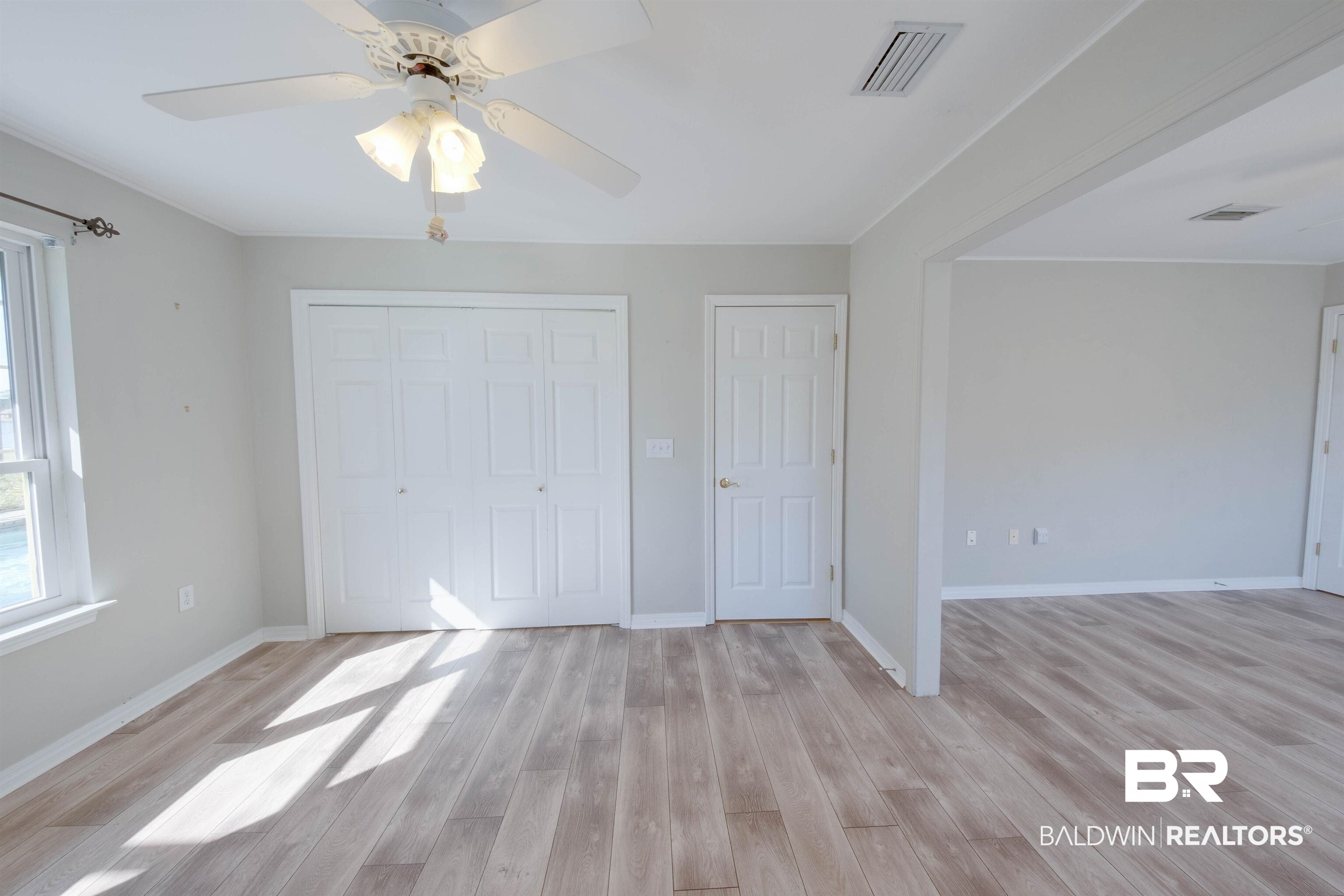 9462 Lakeview Drive Foley, AL 36535 - Photo 38 of 50 Unfurnished bedroom featuring ceiling fan and light wood-type flooring