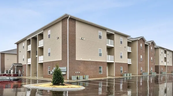 a front view of a building with street view