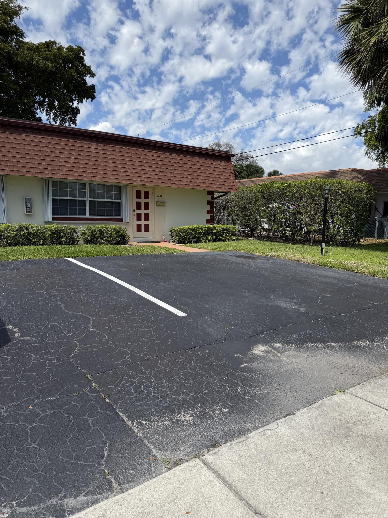 3225 Northeast 21st Avenue, Unit 7 Lighthouse Point, FL 33064 - Photo 2 of 28 a view of a basketball court