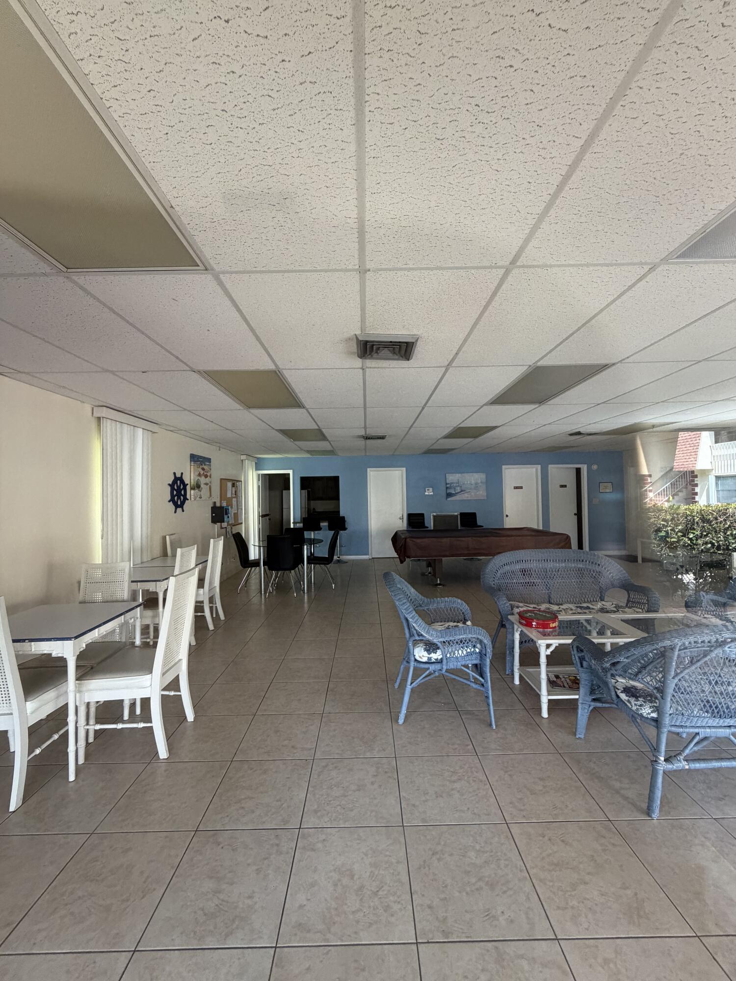 3225 Northeast 21st Avenue, Unit 7 Lighthouse Point, FL 33064 - Photo 28 of 28 a view of a dining room kitchen and livingroom