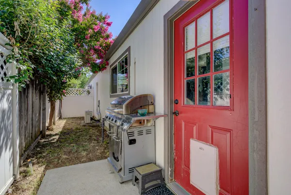a house view with a backyard space