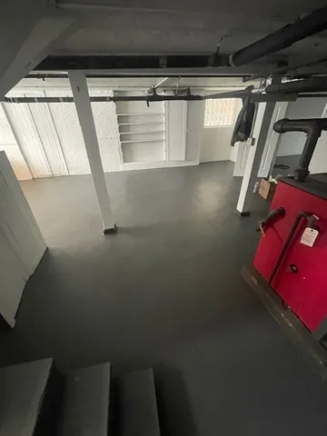 an aerial view of multiple houses with a yard