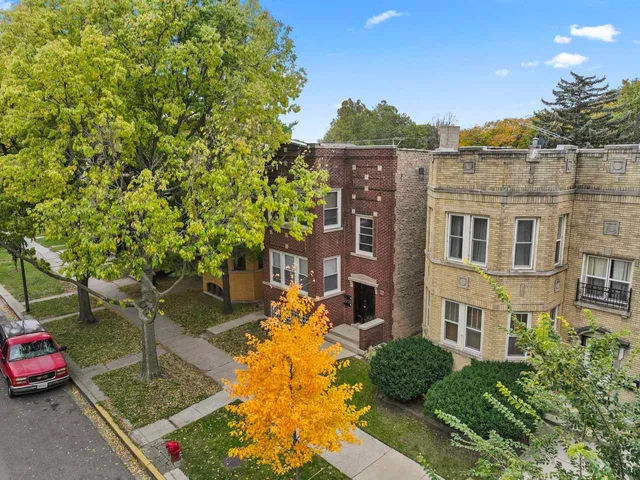 an aerial view of residential house with parking space
