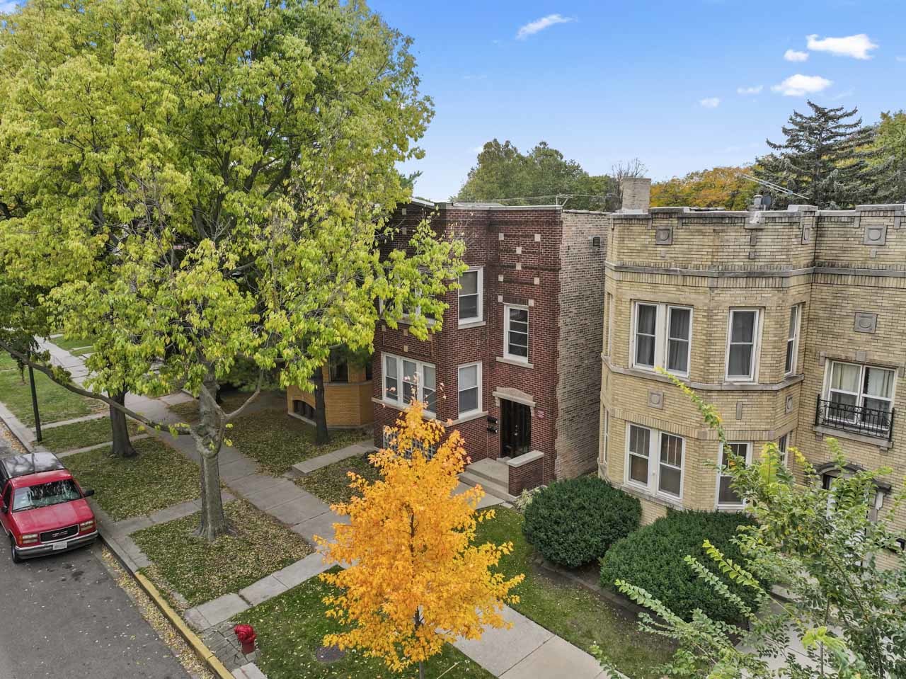5728 North Maplewood Avenue Chicago, IL 60659 - Photo 26 of 30 a view of a house with a garden and pathway