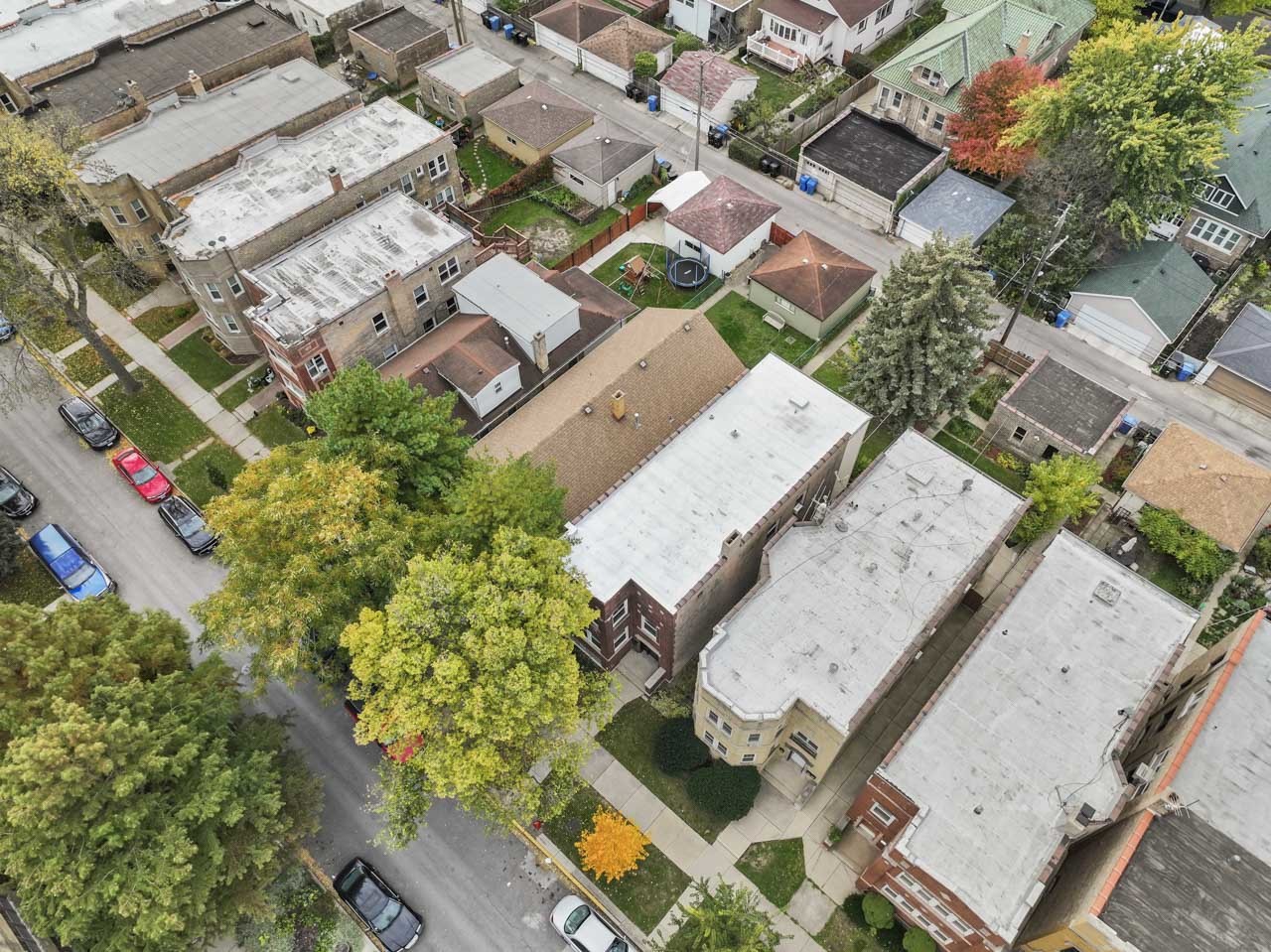 5728 North Maplewood Avenue Chicago, IL 60659 - Photo 29 of 30 an aerial view of residential house with parking space