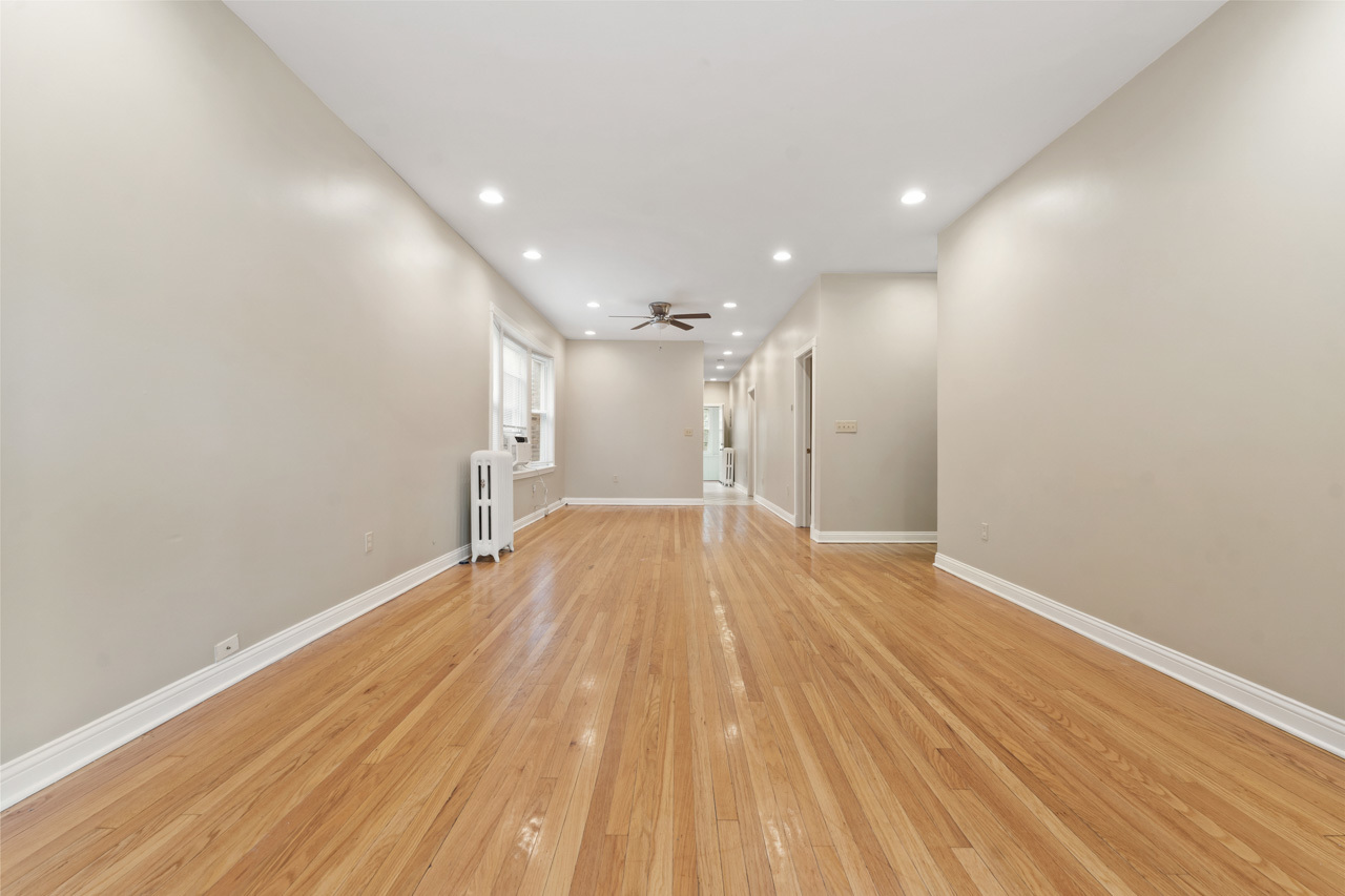 5728 North Maplewood Avenue Chicago, IL 60659 - Photo 10 of 30 a view of empty room with wooden floor