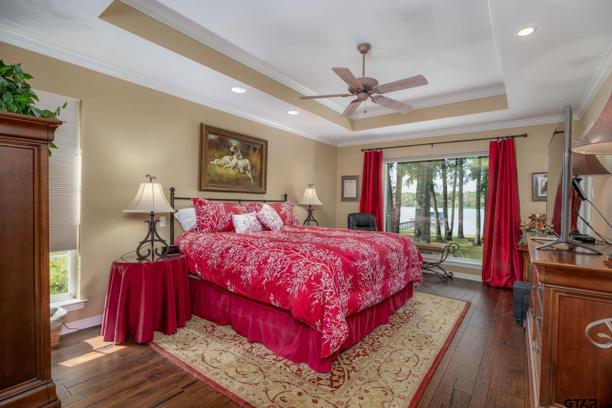 14312 East Ridge Road Arp, TX 75750 - Photo 14 of 44 a bed sitting in a bedroom next to a window