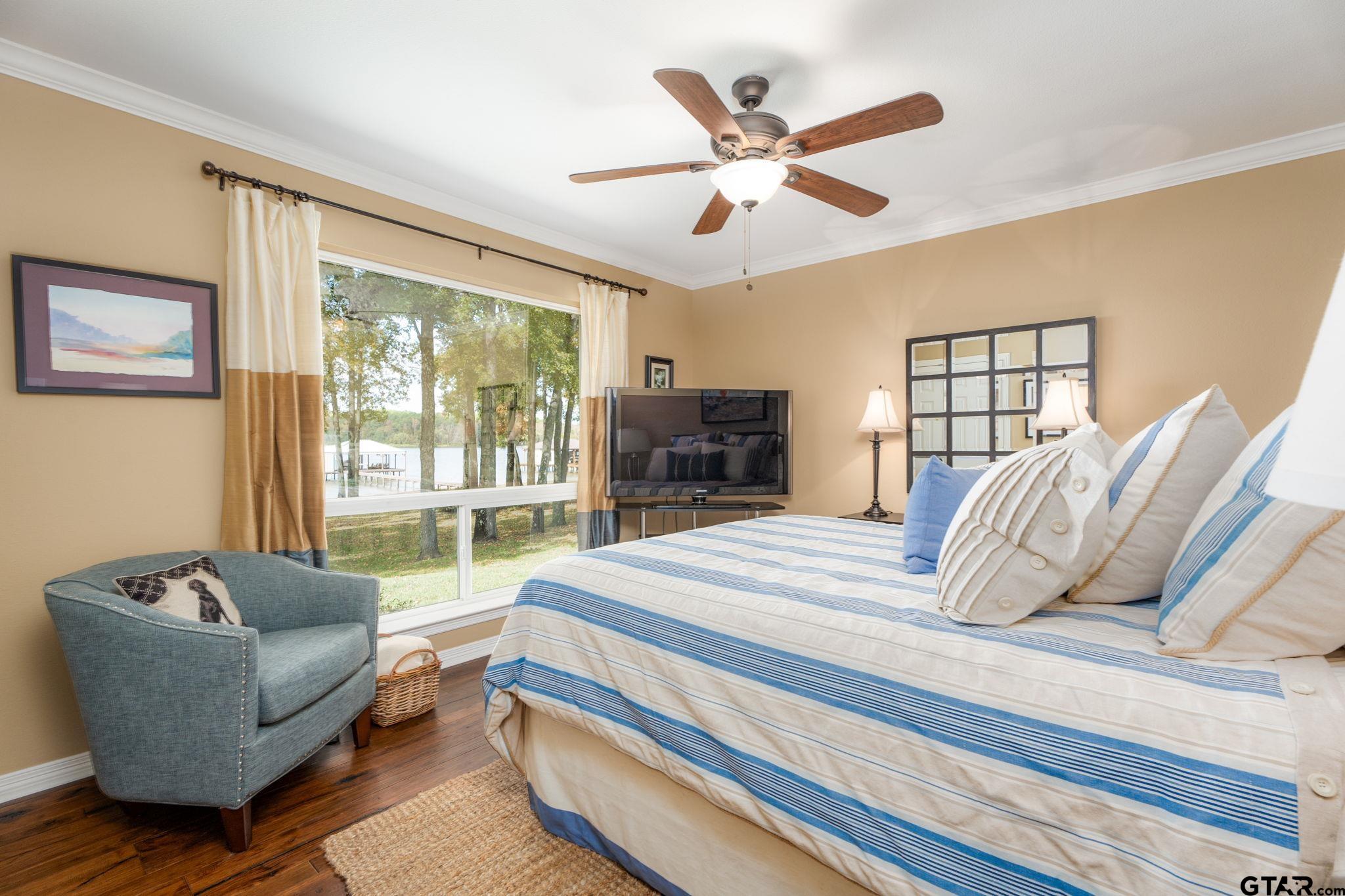 14312 East Ridge Road Arp, TX 75750 - Photo 20 of 44 a bedroom with a bed and a large window