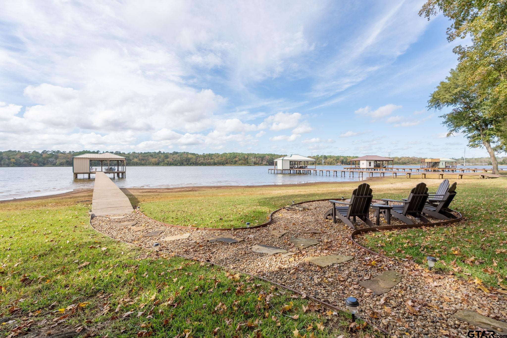 14312 East Ridge Road Arp, TX 75750 - Photo 32 of 44 a view of a lake with outdoor space