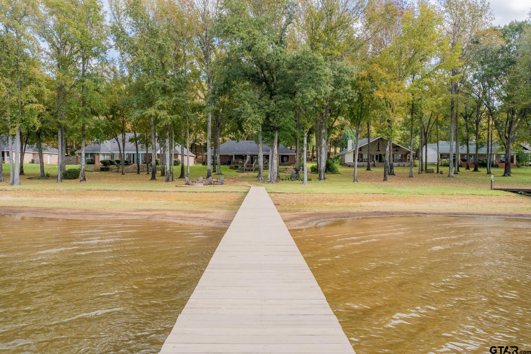 14312 East Ridge Road Arp, TX 75750 - Photo 35 of 44 a swimming pool with outdoor seating and yard