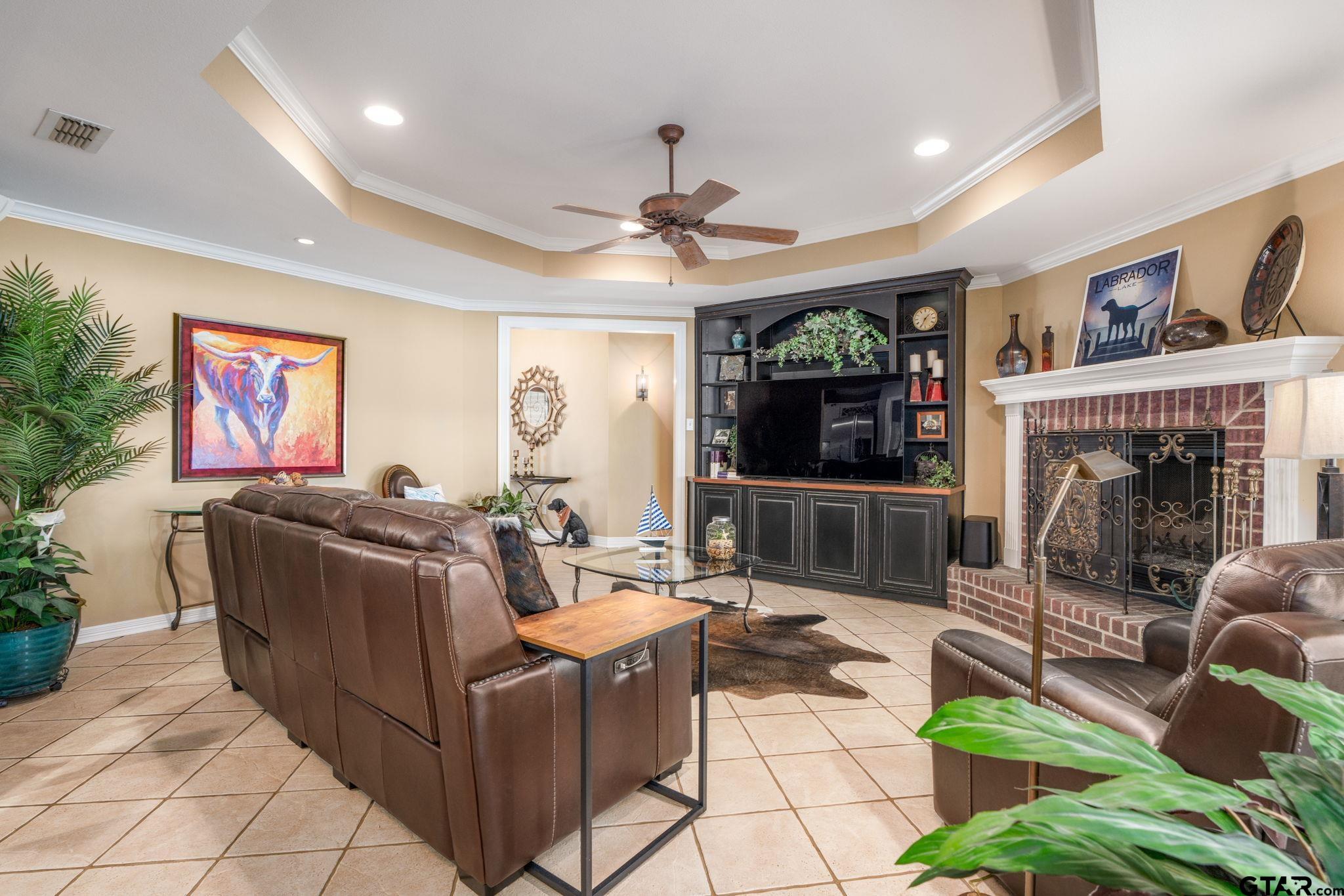 14312 East Ridge Road Arp, TX 75750 - Photo 7 of 44 a living room with fireplace furniture and a flat screen tv