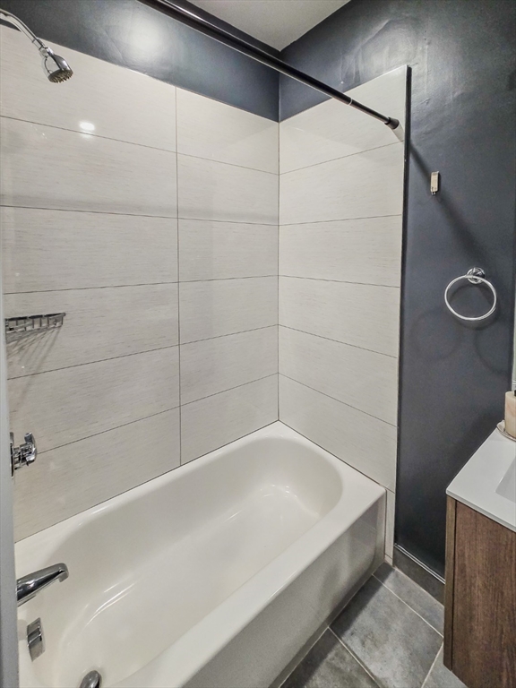 34 Dix Street, Unit 5 Boston, MA 02122 - Photo 15 of 23 a bathroom with a bathtub