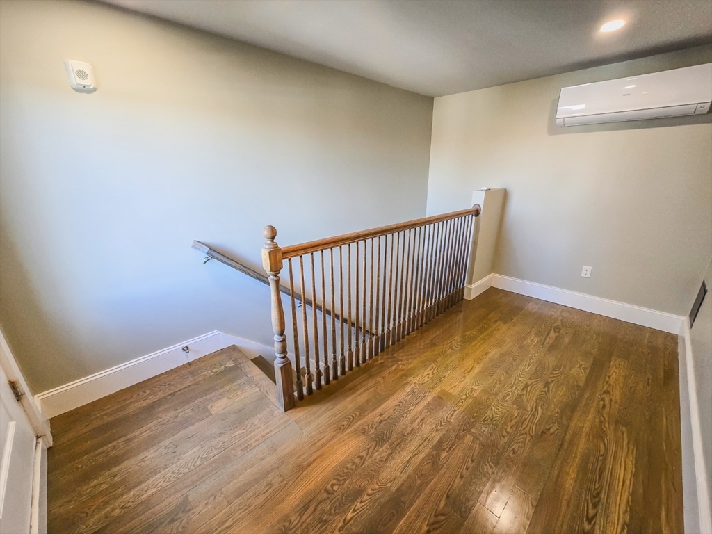 34 Dix Street, Unit 5 Boston, MA 02122 - Photo 17 of 23 a view of a room with wooden floor