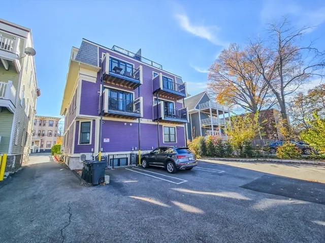 a view of street with parked cars