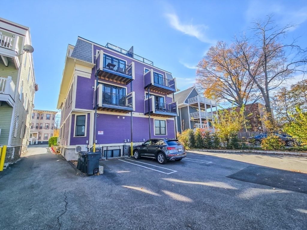 34 Dix Street, Unit 5 Boston, MA 02122 - Photo 21 of 23 a cars parked on the side of a street