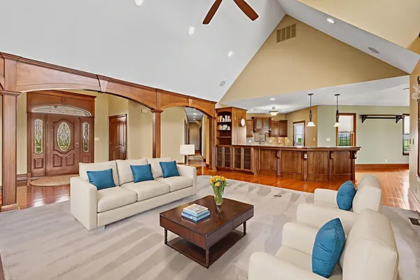 a living room with furniture and a table