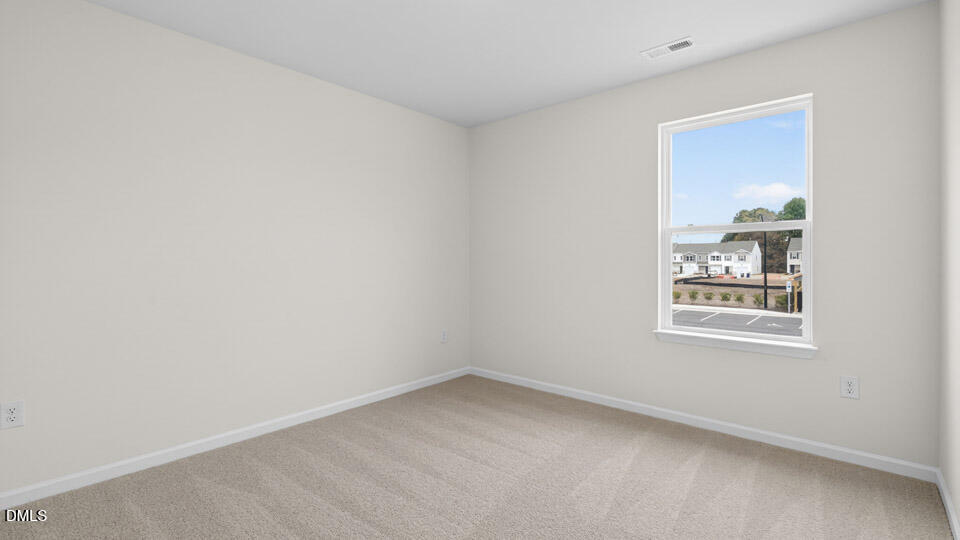 28 Red Clover Drive Angier, NC 27501 - Photo 19 of 41 an empty room with a window