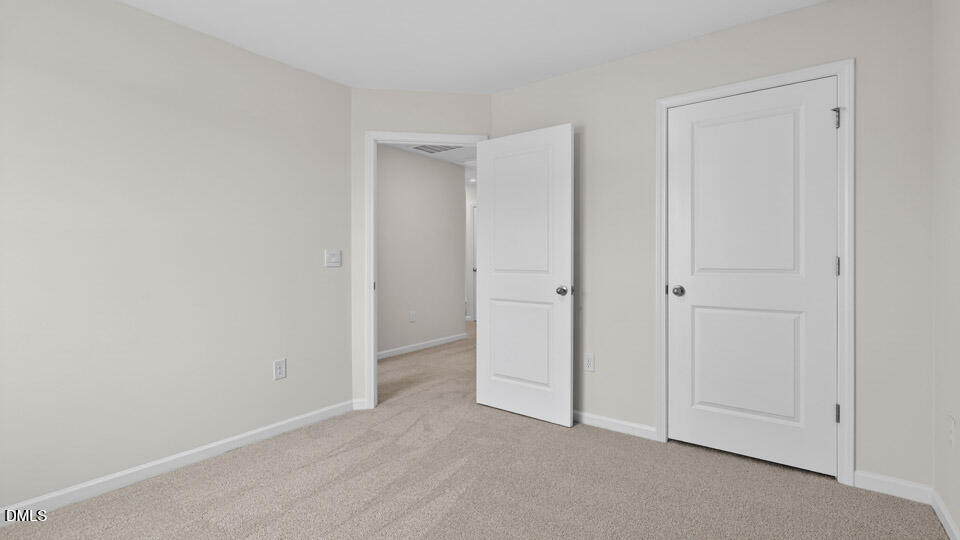 28 Red Clover Drive Angier, NC 27501 - Photo 22 of 41 an empty room with closet area