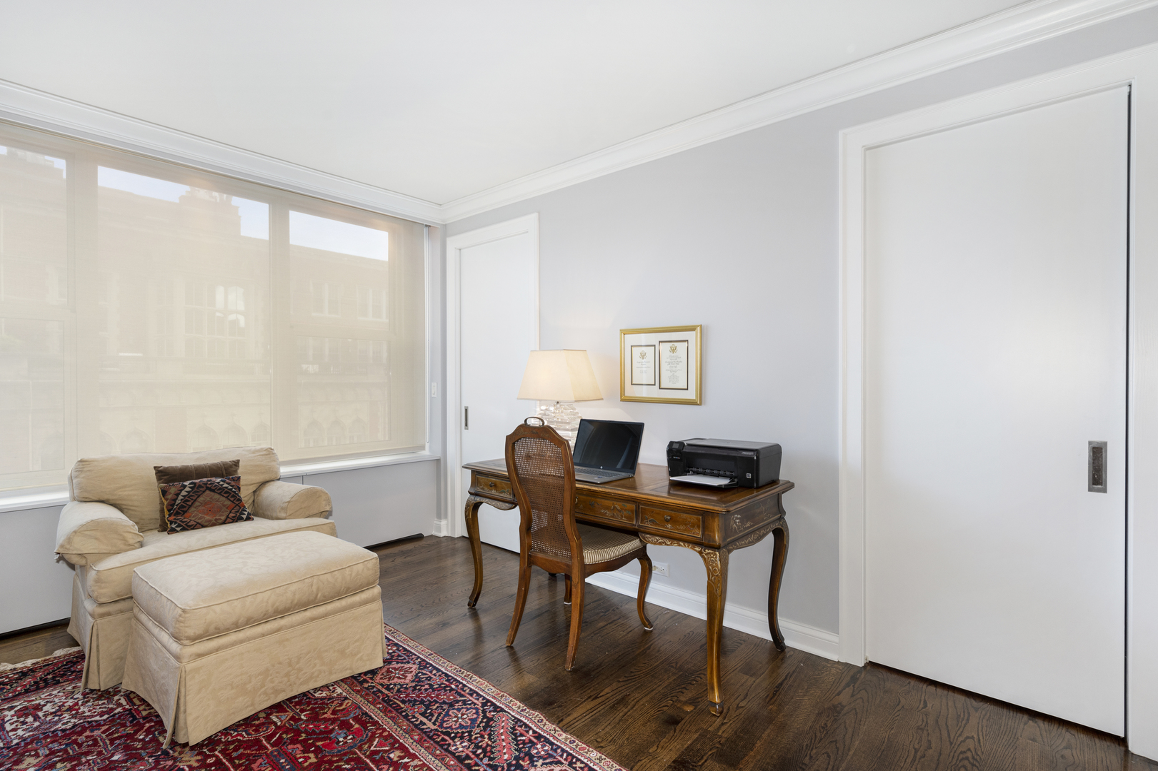 1325 North State Parkway, Unit 16B Chicago, IL 60610 - Photo 22 of 35 a living room with furniture and a window