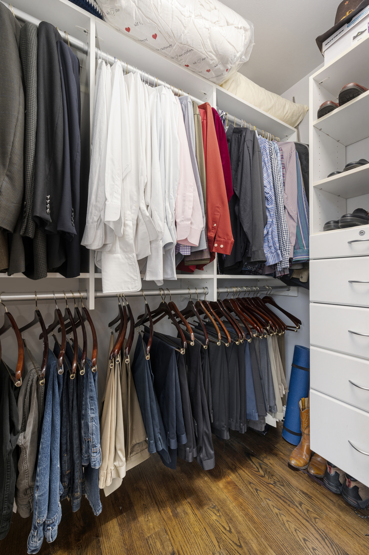 1325 North State Parkway, Unit 16B Chicago, IL 60610 - Photo 24 of 35 a view of walk in closet with clothes