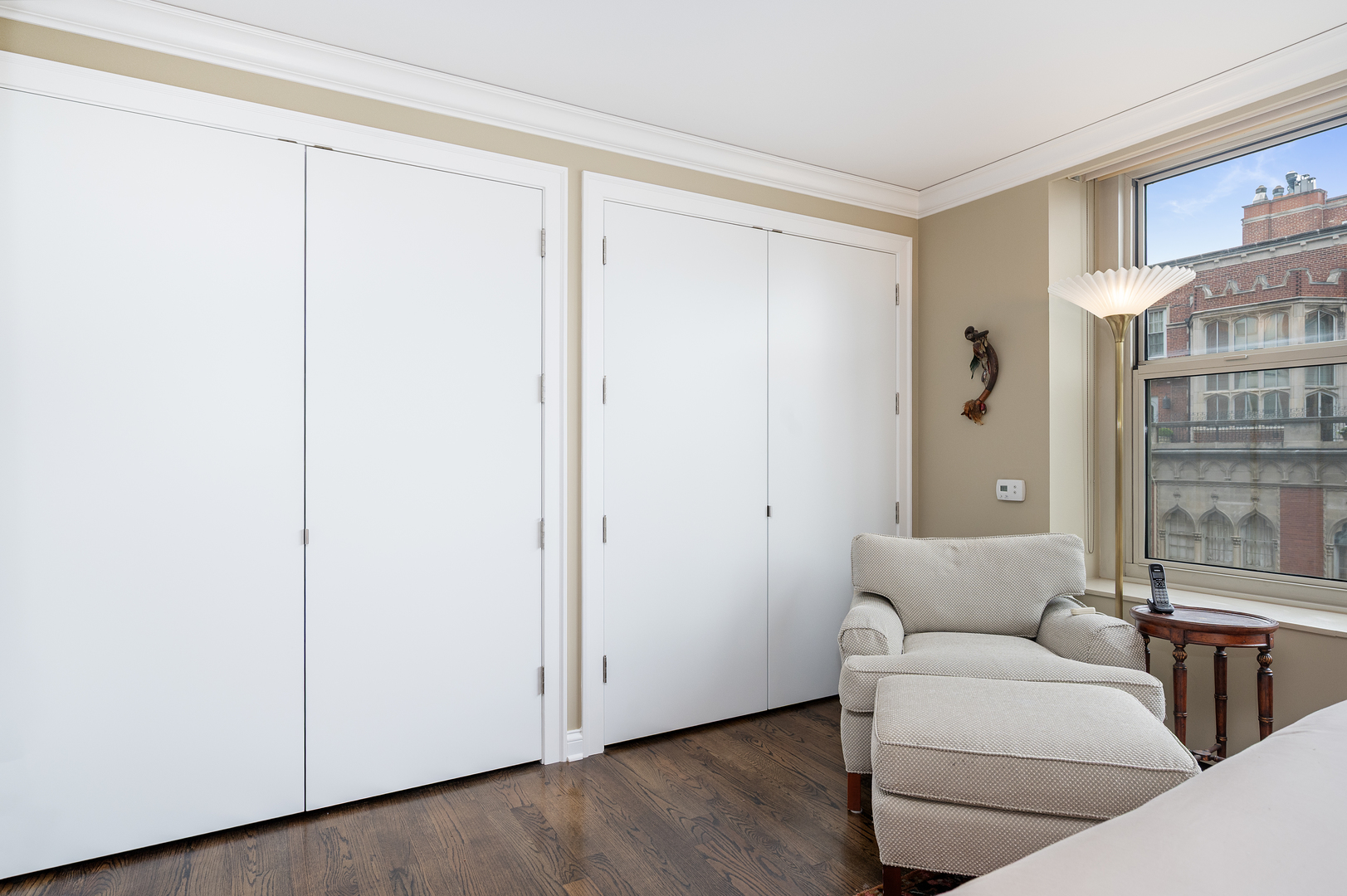 1325 North State Parkway, Unit 16B Chicago, IL 60610 - Photo 28 of 35 a living room with furniture and a gate