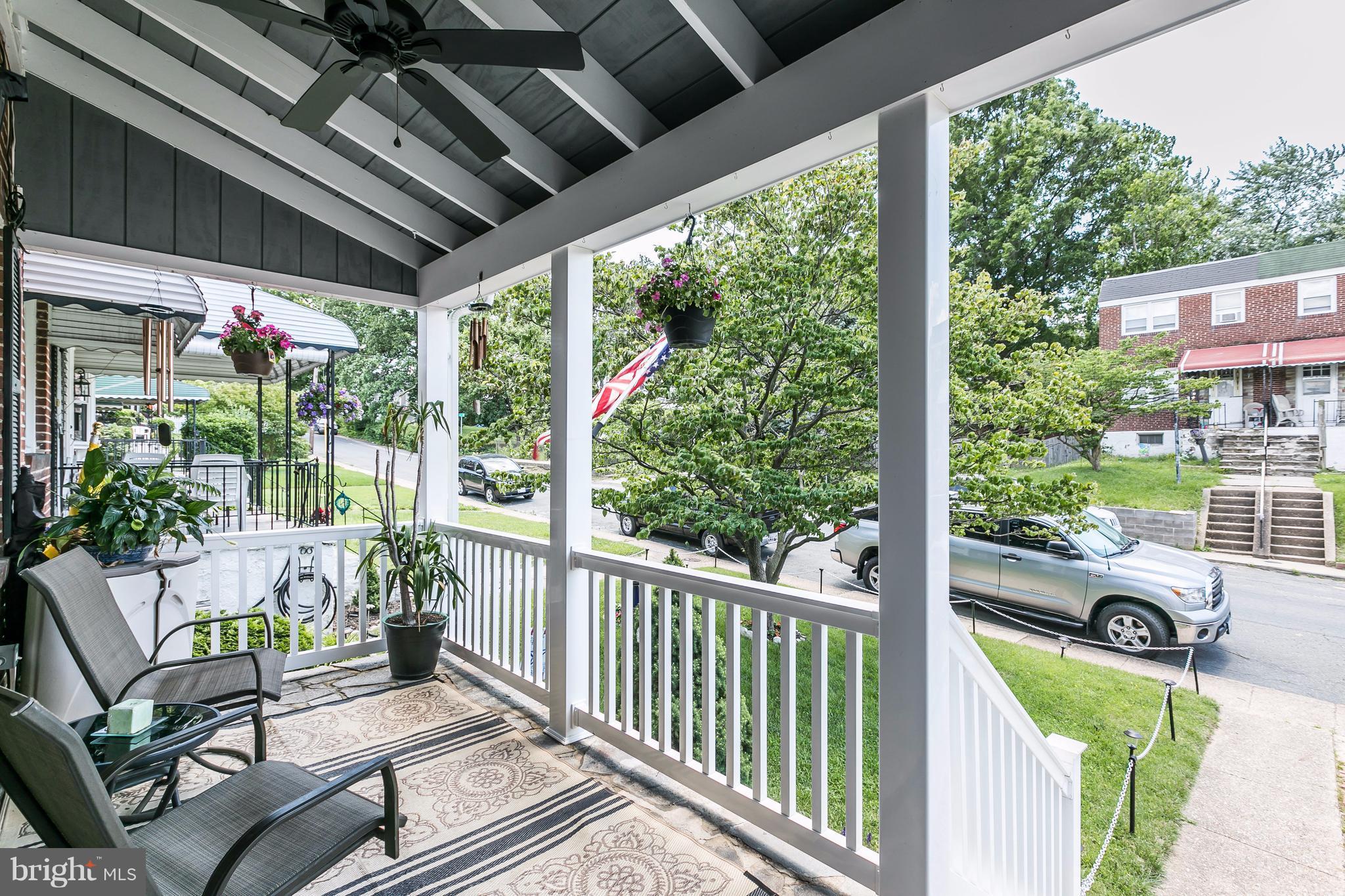 226 Arden Road West Baltimore, MD 21225 - Photo 3 of 29 covered front porch with vinyl railings