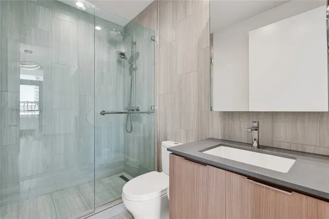a view of a hallway with washer and dryer