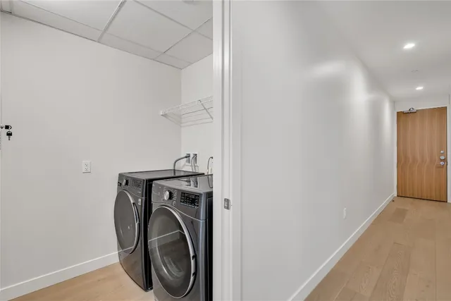 a bathroom with a double vanity sink a and a shower