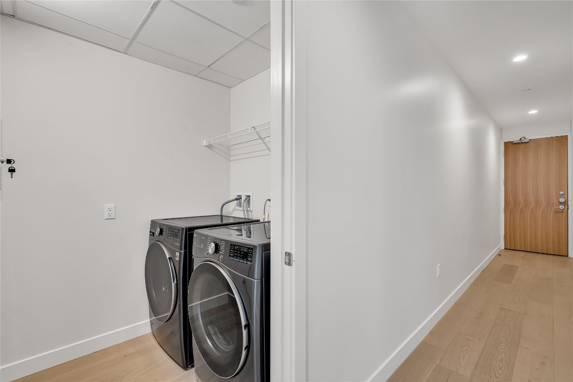 44 East Avenue, Unit 3107 Austin, TX 78701 - Photo 21 of 40 a utility room with dryer and washer