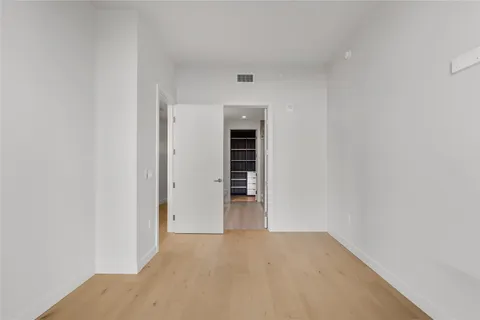 a view of a city with tall buildings