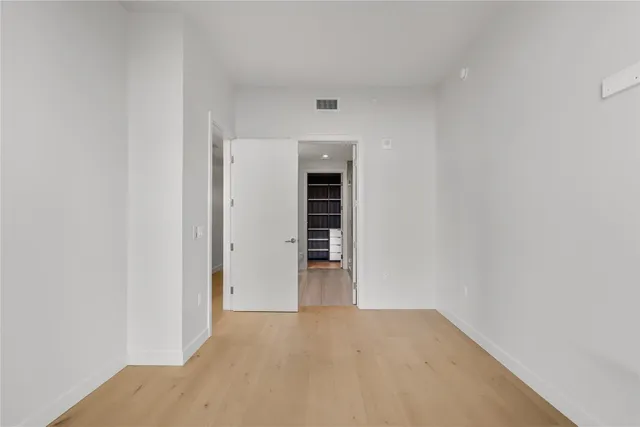 a view of a city with tall buildings