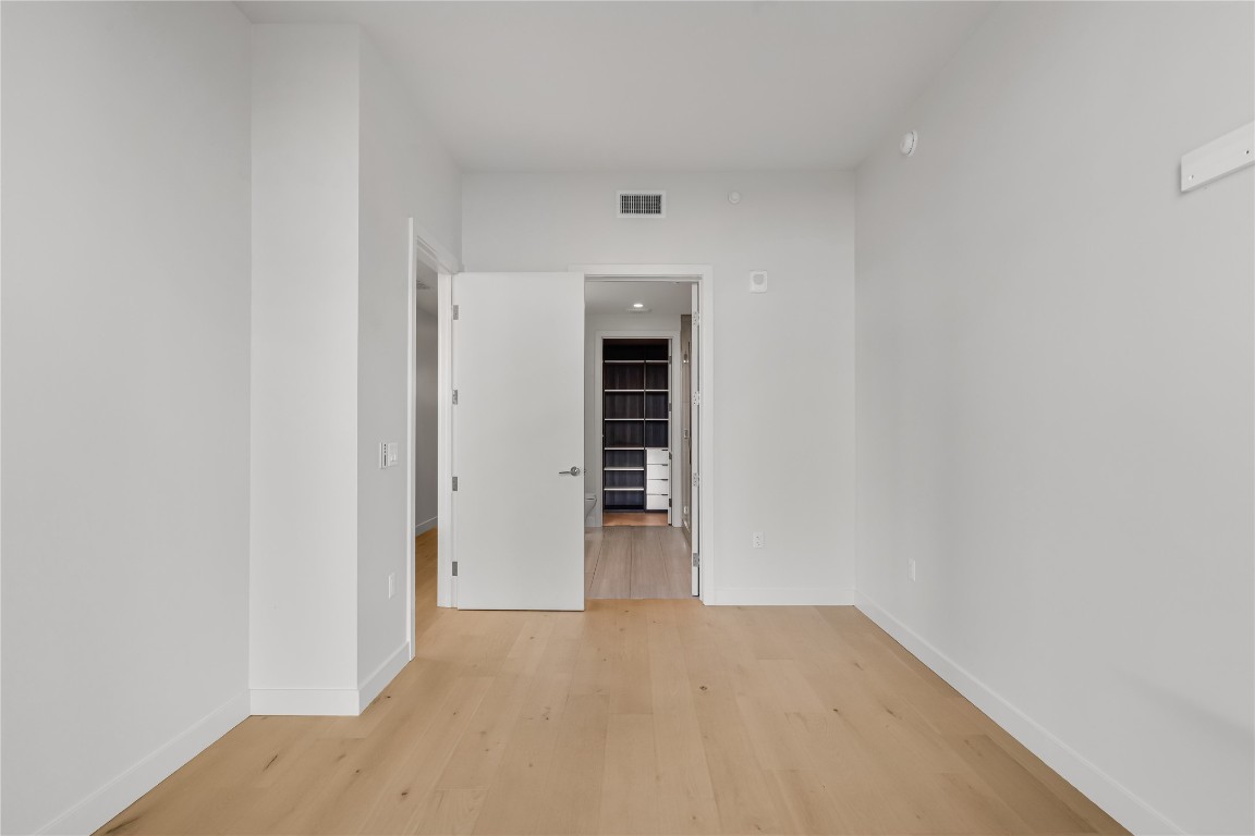 44 East Avenue, Unit 3107 Austin, TX 78701 - Photo 29 of 40 a view of an empty room with a window