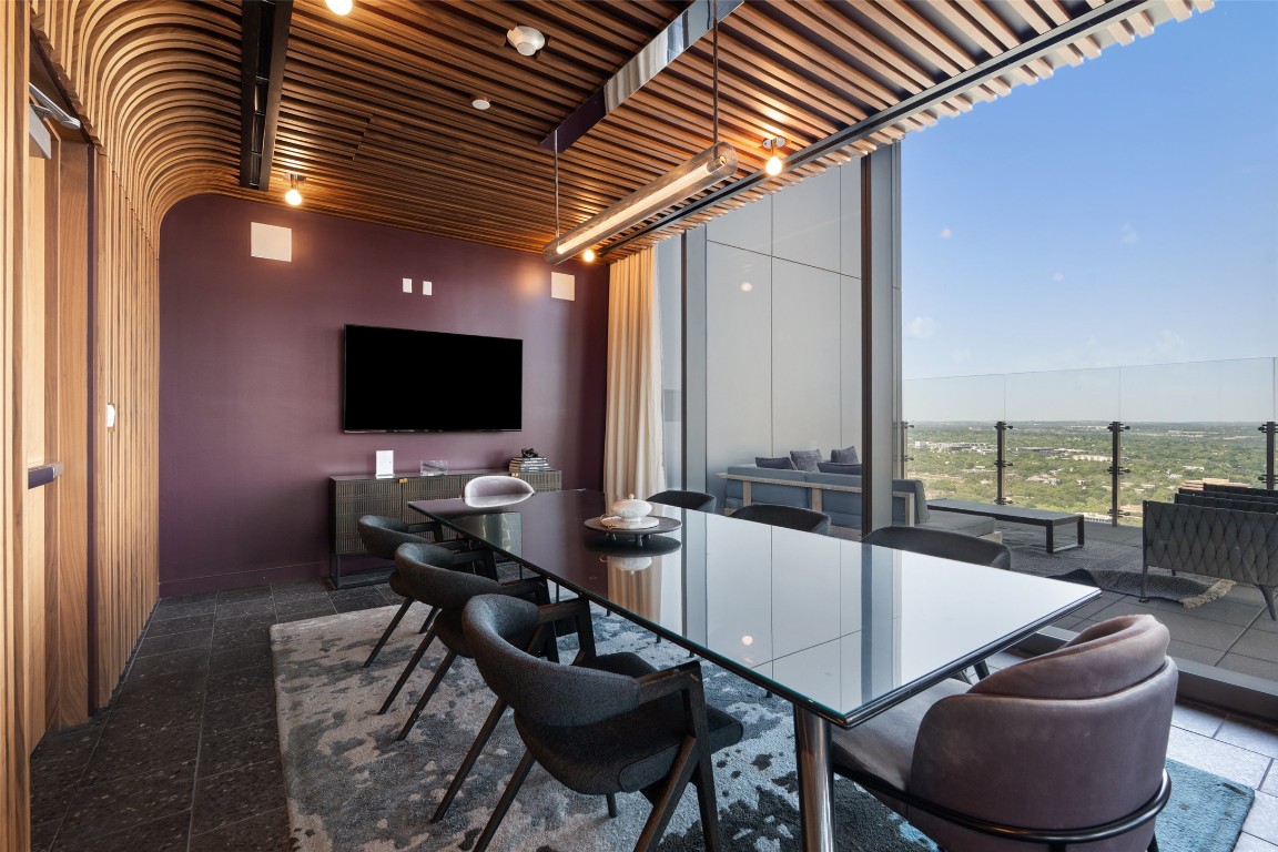 44 East Avenue, Unit 3107 Austin, TX 78701 - Photo 40 of 40 a living room with furniture and a flat screen tv
