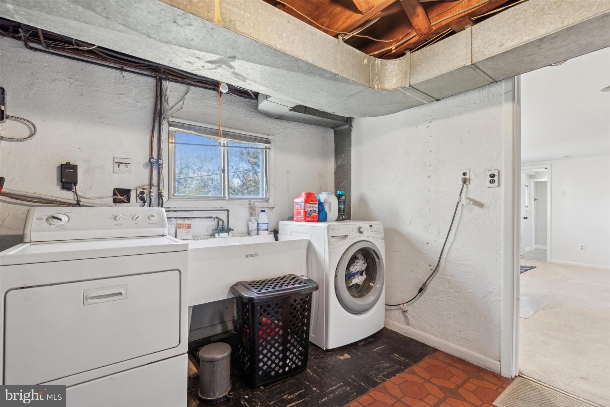 135 Cornell Road Bala Cynwyd, PA 19004 - Photo 20 of 23 a utility room with dryer and washer