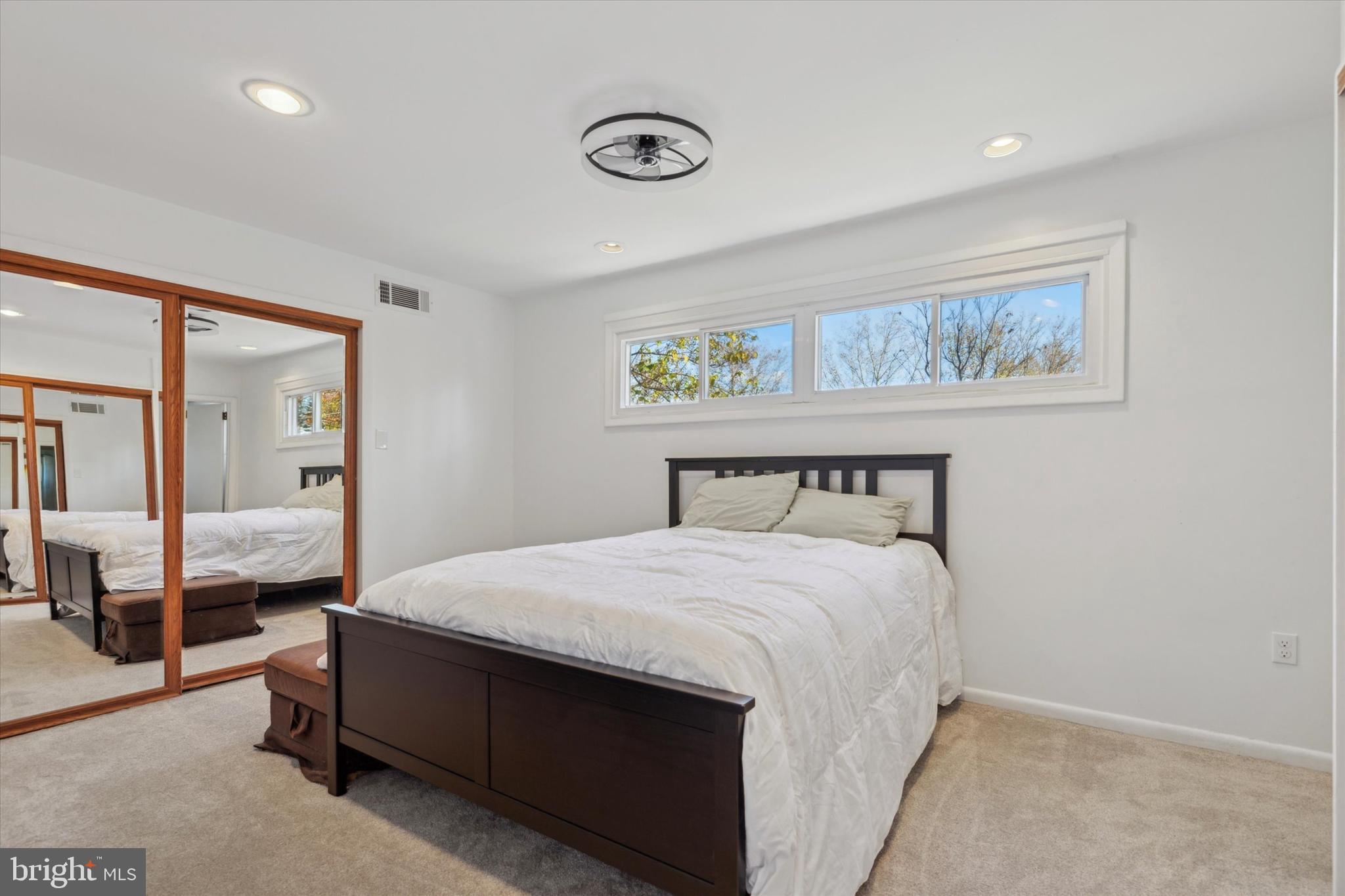 135 Cornell Road Bala Cynwyd, PA 19004 - Photo 9 of 23 a bedroom with a bed and a mirror