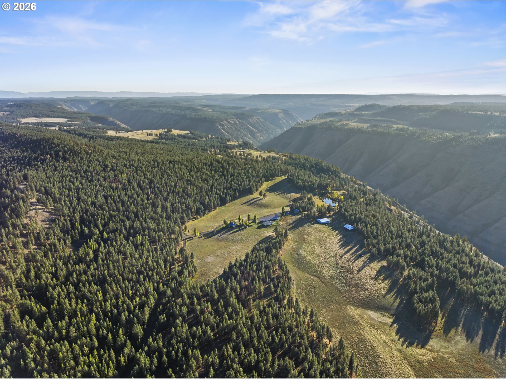 83584 Troy Road Wallowa, OR 97885 - Photo 2 of 48 a view of a lake in middle of the town