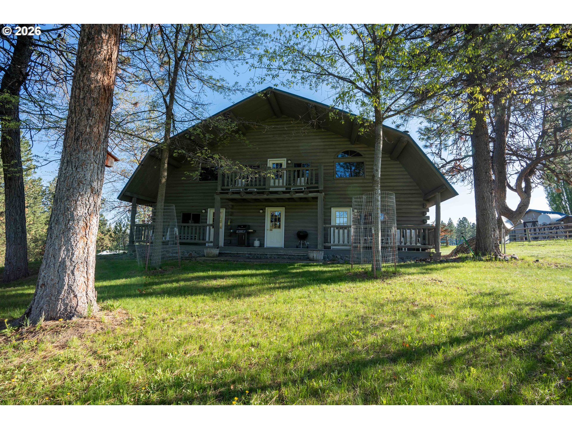 83584 Troy Road Wallowa, OR 97885 - Photo 38 of 48 a view of a house with swimming pool